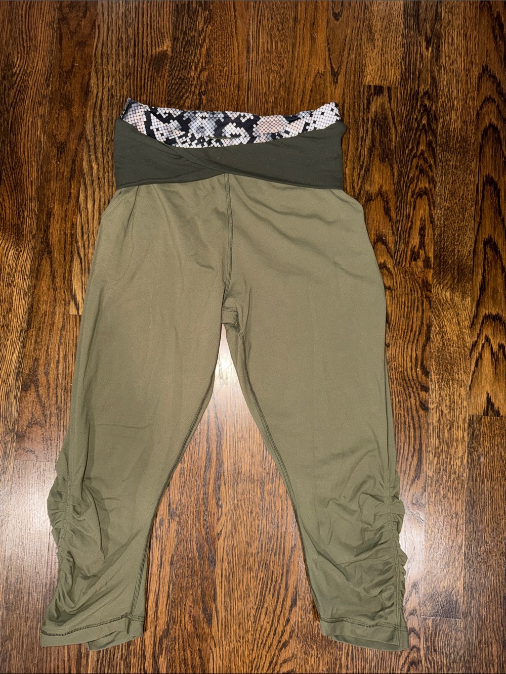 Lululemon Olive Green Capri Leggings with Snake-Print Waistband
